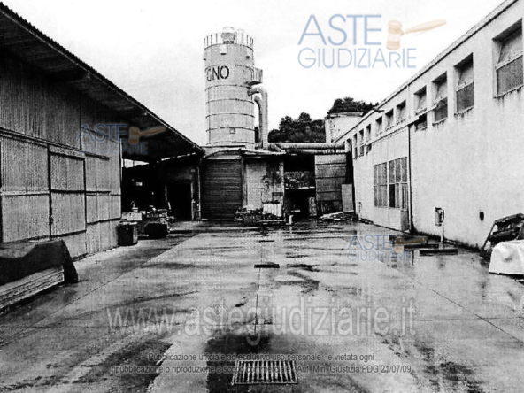 Diritto di piena proprietà (1/1). Fabbricato industriale ubicato in Oliena (NU)- via Bellieni n. 4-6-8